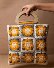 Daisy Dream crochet bag, handmade eco-friendly tote by The Mango House Trust